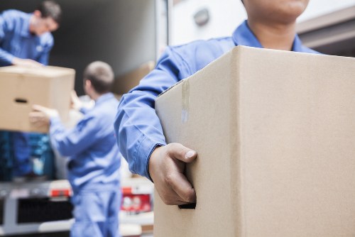 Professional office removals planning in Finsbury Park with packed boxes and furniture