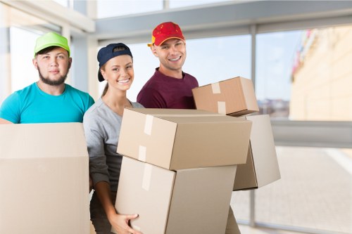 Moving van and boxes at the start of a transparent pricing section for Finsbury Park removals