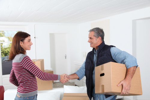 Local Finsburypark movers handling furniture in a residential street