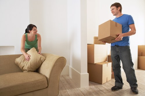 Furniture removal team handling household items in Finsbury Park